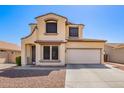Charming two-story home with a two-car garage and low-maintenance desert landscaping at 6505 S 15Th Dr, Phoenix, AZ 85041
