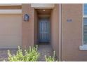 Welcoming front entryway with a stylish door, lantern, and a 'no soliciting' sign at 1221 E Jahns Dr, Casa Grande, AZ 85122