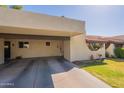 Well-maintained desert home with covered parking and a decorative entryway at 131 N Higley Rd # 41, Mesa, AZ 85205