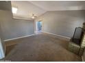 Living room with carpet, fireplace, sliding glass doors, and open floor plan at 2515 S Maple Ave # 103, Tempe, AZ 85282
