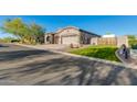 Single-Gathering home featuring desert landscaping, and a spacious three-car garage in a well maintained community at 1753 N Berrett --, Mesa, AZ 85207