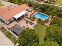 Aerial view of backyard featuring a sparkling pool, gazebo, and patio at 18132 E Vencino St, Gilbert, AZ 85298