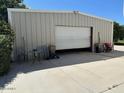 Exterior view of barn and garage with concrete driveway at 18132 E Vencino St, Gilbert, AZ 85298