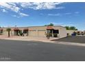 Inviting single-story home featuring a charming front exterior, complemented by an attached garage at 440 S Parkcrest -- # 22, Mesa, AZ 85206