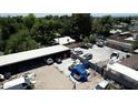 Aerial view of large lot with street and surrounding houses at 1039 E Broadway Rd, Mesa, AZ 85204