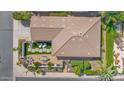 Overhead view of a home highlighting the backyard layout with patio and landscaping at 1462 E Sweet Citrus Dr, Queen Creek, AZ 85140