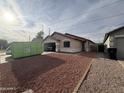 Cozy single story home with attached garage and low maintenance desert landscaping at 1546 W Vaughn Ave, Gilbert, AZ 85233