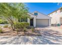 Charming single-story home featuring a two-car garage, low-maintenance landscaping, and a neutral color palette at 20644 W Mariposa St, Buckeye, AZ 85396