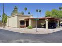 Charming single-story home with a covered carport and desert landscaping for easy maintenance, with a neighborhood street view at 520 S Sand Verbena Way, Mesa, AZ 85208