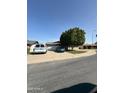 View of home exterior, driveway and landscaping in suburban setting at 730 N Karen Dr, Chandler, AZ 85224