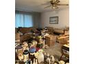 Living room filled with boxes and furniture, natural light from window at 730 N Karen Dr, Chandler, AZ 85224