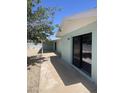 Back of the house featuring a covered patio and smooth concrete walkway at 1010 W 13Th St, Tempe, AZ 85281