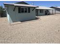 Single-story home with a well-kept exterior, desert landscaping, and covered parking at 1010 W 13Th St, Tempe, AZ 85281