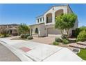 Beautiful two-story home with a brick driveway, manicured landscaping, and inviting curb appeal at 22306 N 34Th Pl, Phoenix, AZ 85050