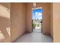 View of the wrought iron gate at the entrance to the residence at 27581 N 129Th Ln, Peoria, AZ 85383