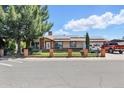 Beautiful single-story home with solar panels, manicured lawn, and a welcoming front facade at 3107 N 79Th Ave, Phoenix, AZ 85033