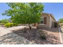 Attractive home showcasing desert landscaping, charming shutters, and a neatly paved driveway and walkway at 3507 E Alfalfa Dr, Gilbert, AZ 85298