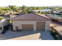 Large multi-car garage with ample parking space, complemented by well-maintained landscaping and a neutral exterior at 3927 E Vista Grande --, San Tan Valley, AZ 85140