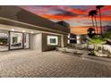 Stunning exterior with desert landscaping and attached garage at 4835 E Onyx Ave, Paradise Valley, AZ 85253