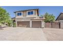 Charming home with a spacious driveway and a two-car garage at 656 W Devon Ct, Gilbert, AZ 85233