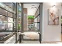 Bright entryway featuring a window bench and view to an outdoor lounge at 7117 E Rancho Vista Dr # 1012, Scottsdale, AZ 85251