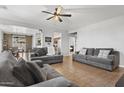 Bright living room featuring tile floors and neutral decor at 7305 W Darrel Rd, Laveen, AZ 85339