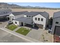Stunning aerial view of a modern home, showcasing its unique architecture and landscaped surroundings at 8503 S 9Th Dr # 17, Phoenix, AZ 85041