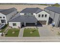 Stylish aerial view captures the modern home's layout and beautiful landscaping, highlighting curb appeal at 8503 S 9Th Dr # 17, Phoenix, AZ 85041