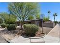 Street view of single-story home with desert landscaping at 105 E Hermosa Dr, Tempe, AZ 85282