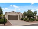 Well-maintained single-story home with desert landscaping, spacious driveway, and a neatly kept front yard at 13414 W San Pablo Dr, Sun City West, AZ 85375