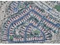 Aerial view of a neighborhood with single-Gathering homes, most with private pools, and desert landscaping at 1766 N Channing --, Mesa, AZ 85207