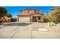 Inviting two-story home features a well-manicured front yard and an attached two-car garage at 33602 N Cobble Stone Dr, San Tan Valley, AZ 85143