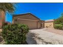 Charming single-story home featuring a low-maintenance desert landscape, covered entryway and a two car garage at 3719 W Carson Rd, Phoenix, AZ 85041