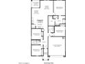 This spacious floor plan includes a great room, dining room, and kitchen area at 38080 W Bello Ln, Maricopa, AZ 85138