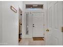 Bright foyer featuring a tile floor, neutral walls, and ample natural light at 7006 E Jensen St # 48, Mesa, AZ 85207