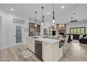 Spacious kitchen with a large island, modern appliances, and an open floor plan at 21228 E Excelsior Ave, Queen Creek, AZ 85142
