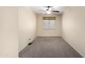 Clean, neutral bedroom with carpet and a ceiling fan at 22508 W Antelope Trl, Buckeye, AZ 85326