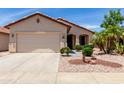 Charming single-story home features a well-manicured yard and attached two-car garage at 22508 W Antelope Trl, Buckeye, AZ 85326
