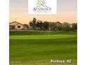 Scenic view of the lush green Sundance Golf Club course, perfect for a relaxing day of golf at 22508 W Antelope Trl, Buckeye, AZ 85326