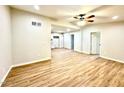 Bright living room featuring fresh paint and new floors; a cozy, inviting space at 2258 E Alpine Ave, Mesa, AZ 85204