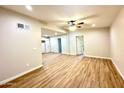 Bright living room featuring fresh paint and new floors; a cozy, inviting space at 2258 E Alpine Ave, Mesa, AZ 85204