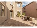Private courtyard with brick pavers and seating area, perfect for outdoor relaxation and entertaining at 3964 E Hummingbird Ln, Phoenix, AZ 85050