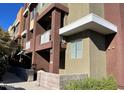 Modern townhouse showcasing neutral-toned exterior, private balcony, and well-maintained landscaping around the property at 6605 N 93Rd Ave # 1071, Glendale, AZ 85305