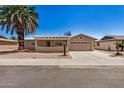 Inviting home with desert landscaping, a two-car garage, and a welcoming front patio at 871 Leisure World --, Mesa, AZ 85206