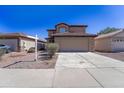 Two-story home featuring a large driveway and neutral-colored exterior with a red tile roof at 11215 W Heatherbrae Dr, Phoenix, AZ 85037