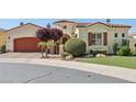 Well-maintained home with warm accents, mature landscaping, and a terra cotta roof at 1535 W Winter Dr, Phoenix, AZ 85021