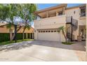 Spacious three car garage with additional outdoor stair access to upper level at 530 S Emerson St, Chandler, AZ 85225