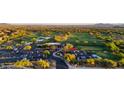 Panoramic aerial view of the community golf course and lush green landscape at 20121 N 76Th St # 2058, Scottsdale, AZ 85255