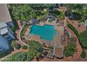 Bird's-eye view of pool with hot tub, lounge chairs, privacy walls, landscaping and patio area at 5203 N 24Th St # 207, Phoenix, AZ 85016