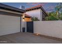 Exterior shot of the garage and entryway with a locked gate in the daylight at 7821 N Via De La Sombre --, Scottsdale, AZ 85258